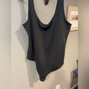 Express Body Contour bodysuit in black. Size large